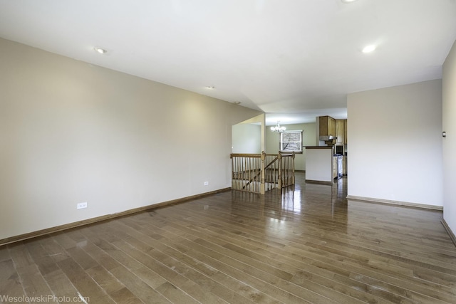 101 Croftwood Ct, Rolling Meadows, IL 60008 - spare room featuring wood finished floors, a chandelier, and recessed lighting