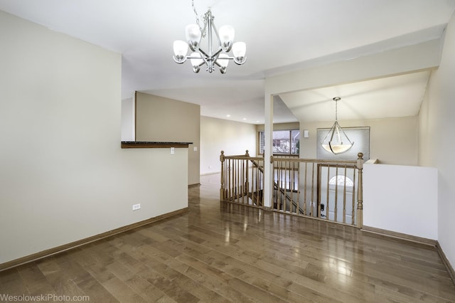 101 Croftwood Ct, Rolling Meadows, IL 60008 - unfurnished room with a chandelier, wood finished floors, and recessed lighting