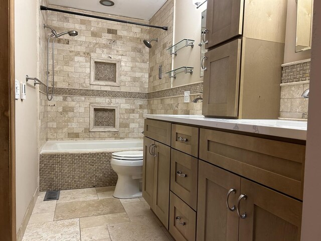 101 Croftwood Ct, Rolling Meadows, IL 60008 - bathroom with tiled shower / bath, vanity, and stone tile floors