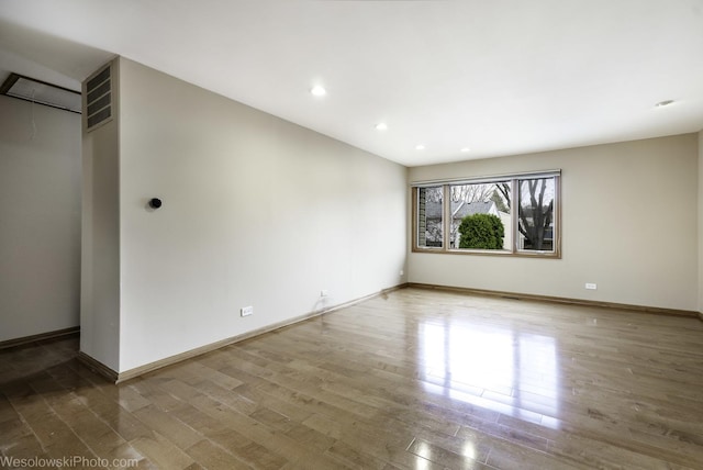 101 Croftwood Ct, Rolling Meadows, IL 60008 - unfurnished room featuring wood finished floors and recessed lighting