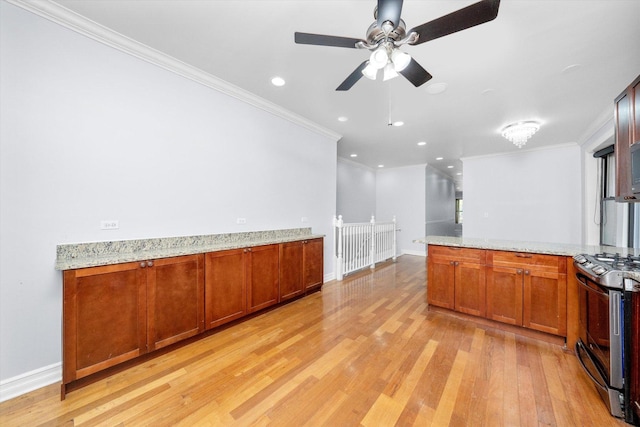 1363 E 64th St Unit 1, Chicago, IL 60637 - kitchen with stainless steel range oven, crown molding, light wood-style flooring, a peninsula, and ceiling fan