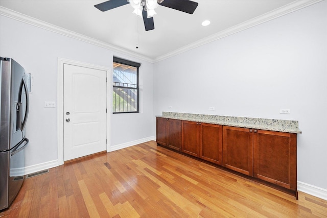 1363 E 64th St Unit 1, Chicago, IL 60637 - unfurnished room with light wood-style flooring, ornamental molding, and ceiling fan