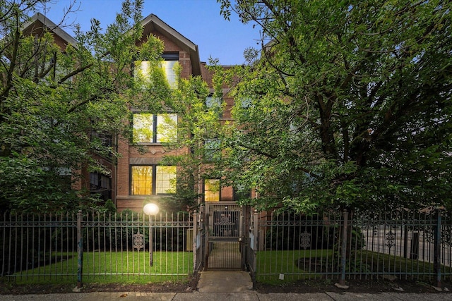 1363 E 64th St Unit 1, Chicago, IL 60637 - view of front facade with a fenced front yard and a gate