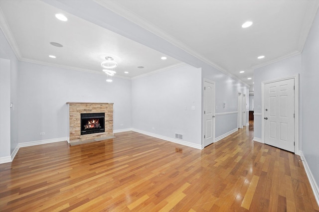 1363 E 64th St Unit 1, Chicago, IL 60637 - unfurnished living room featuring light wood finished floors, a stone fireplace, recessed lighting, and ornamental molding