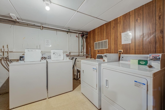 5715 129th St Unit 1A, Crestwood, IL 60418 - shared laundry featuring separate washer and dryer and wooden walls