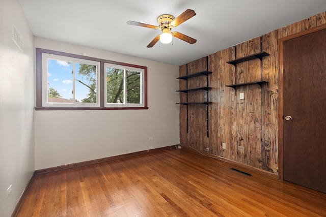 5754 150th St, Oak Forest, IL 60452 - spare room featuring a ceiling fan and wood finished floors