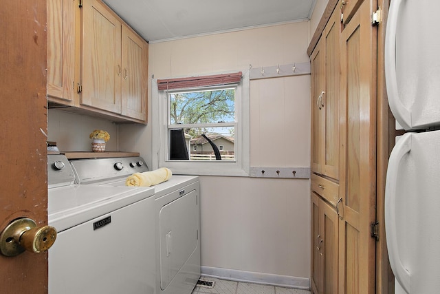 5754 150th St, Oak Forest, IL 60452 - laundry room featuring washer and clothes dryer and cabinet space