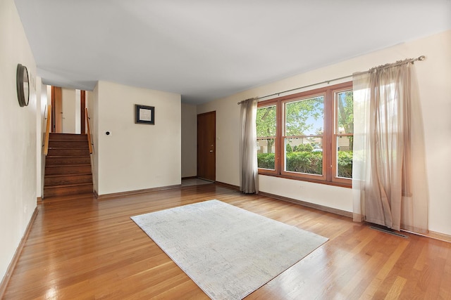 5754 150th St, Oak Forest, IL 60452 - unfurnished room featuring stairway and light wood finished floors