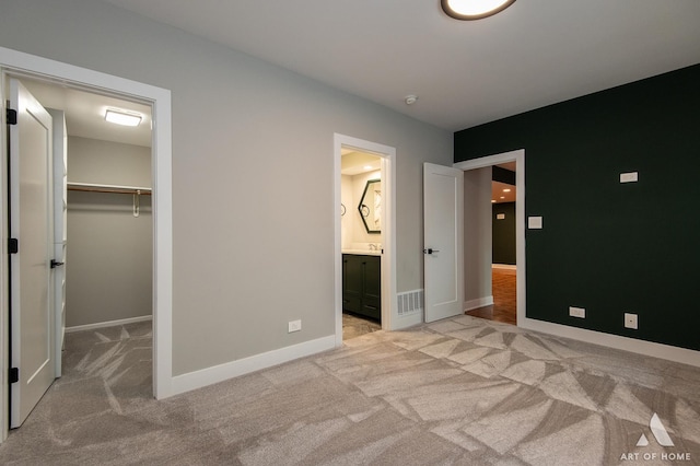 113 Oak Ridge Dr E, Burr Ridge, IL 60527 - unfurnished bedroom featuring light colored carpet, a spacious closet, connected bathroom, and a closet