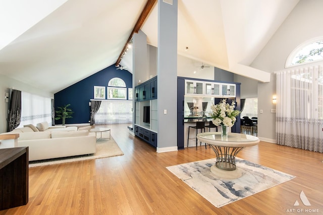 113 Oak Ridge Dr E, Burr Ridge, IL 60527 - living room with high vaulted ceiling, plenty of natural light, light wood-type flooring, beam ceiling, and ceiling fan