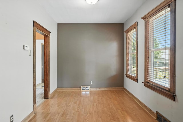 13425 S S Ave M, Chicago, IL 60633 - empty room with light wood-style flooring and baseboards