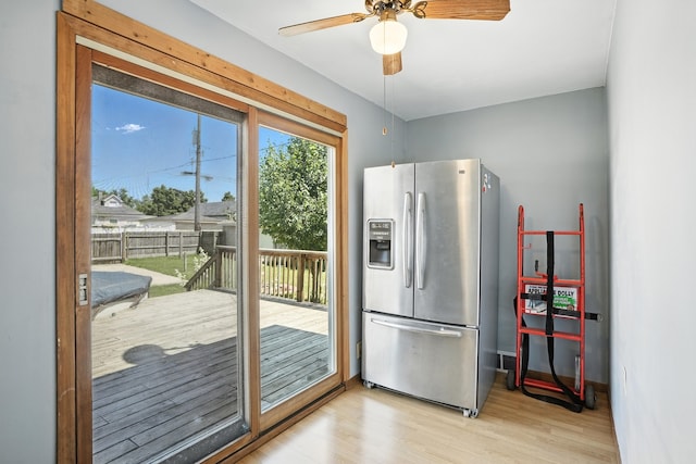 13425 S S Ave M, Chicago, IL 60633 - kitchen featuring stainless steel fridge with ice dispenser, light wood-style flooring, and a ceiling fan