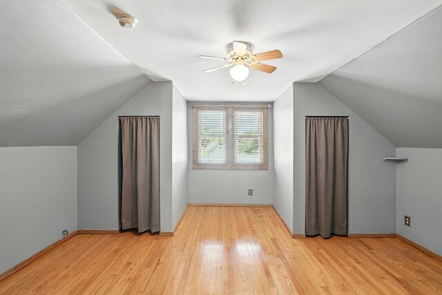 13425 S S Ave M, Chicago, IL 60633 - additional living space featuring vaulted ceiling, light wood finished floors, and ceiling fan