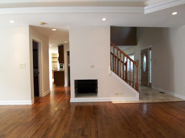 623 Willow Ln, Elk Grove Village, IL 60007 - unfurnished living room with wood finished floors, stairs, recessed lighting, and a fireplace