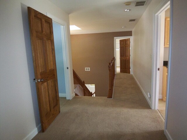 623 Willow Ln, Elk Grove Village, IL 60007 - corridor featuring an upstairs landing and light carpet