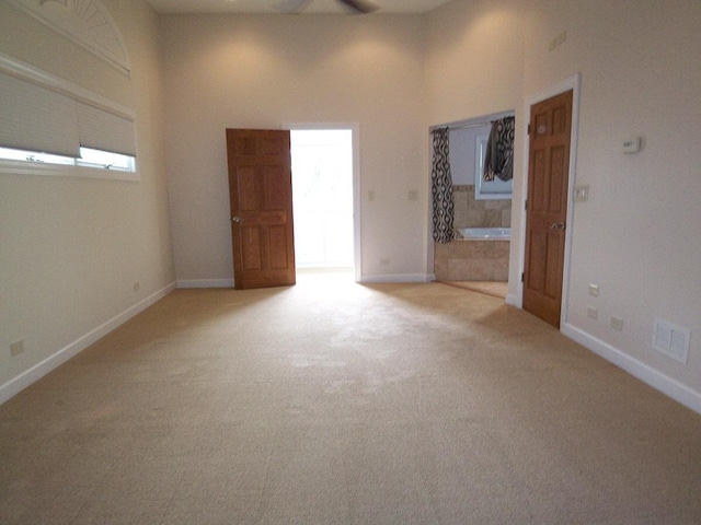 623 Willow Ln, Elk Grove Village, IL 60007 - empty room featuring a ceiling fan and light carpet
