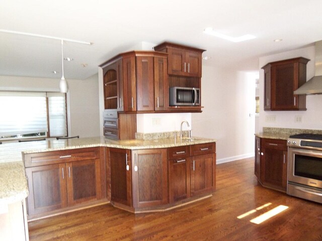 623 Willow Ln, Elk Grove Village, IL 60007 - kitchen featuring stainless steel appliances, wall chimney range hood, dark wood-type flooring, light stone counters, and open shelves