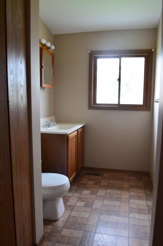 12005 4th St, Huntley, IL 60142 - bathroom with vanity and brick patterned flooring