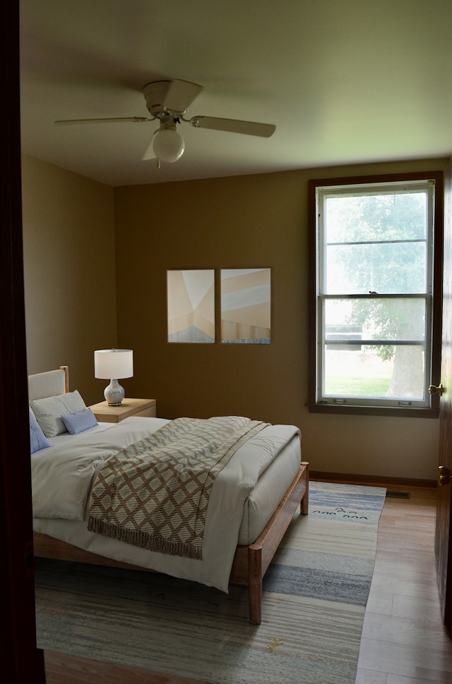 12005 4th St, Huntley, IL 60142 - bedroom featuring wood finished floors and ceiling fan
