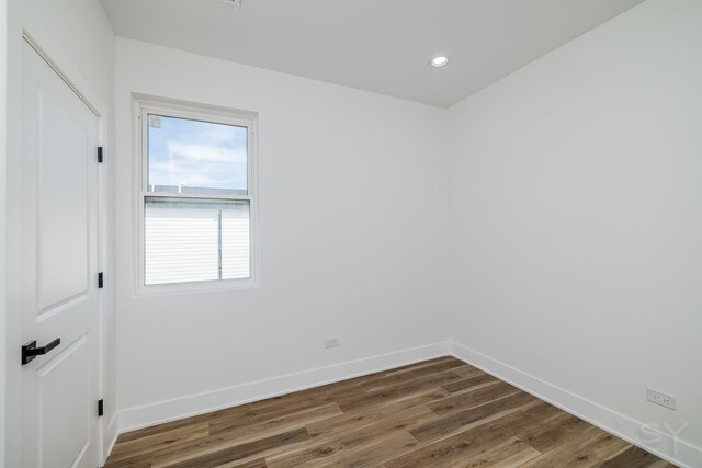6328 S Evans Ave, Chicago, IL 60637 - unfurnished room with wood finished floors and recessed lighting