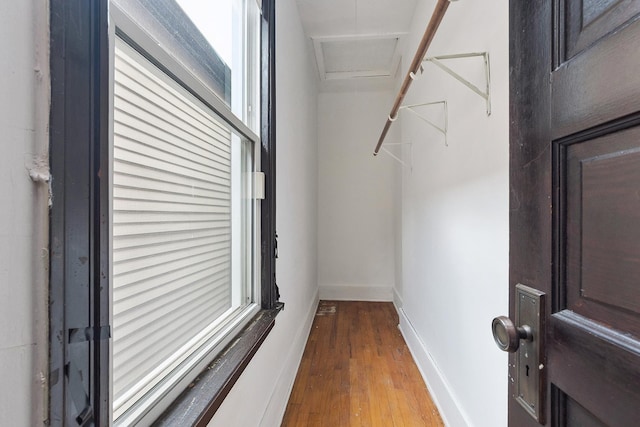 7933 S Burnham Ave, Chicago, IL 60617 - walk in closet featuring hardwood / wood-style floors