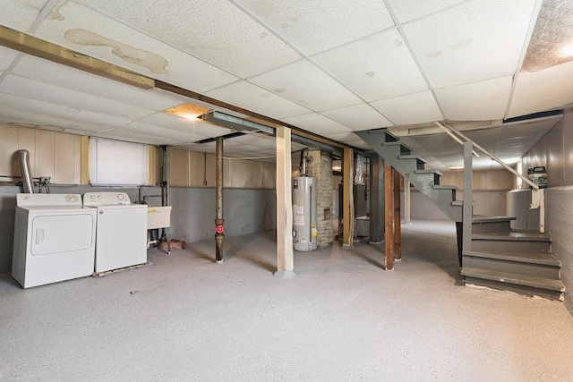 7933 S Burnham Ave, Chicago, IL 60617 - unfinished below grade area featuring gas water heater, separate washer and dryer, stairway, and a drop ceiling