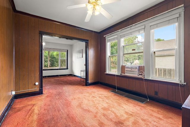 7933 S Burnham Ave, Chicago, IL 60617 - spare room featuring carpet, wooden walls, cooling unit, healthy amount of natural light, and ceiling fan