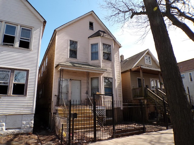 8417 S Mackinaw Ave, Chicago, IL 60617 - view of front of property with a fenced front yard