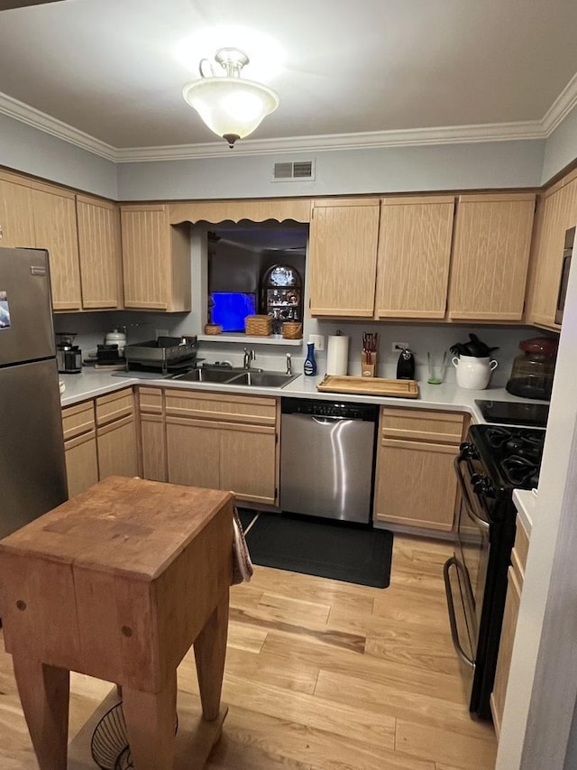 833 Winter Park Dr Unit 833, New Lenox, IL 60451 - kitchen with stainless steel appliances, light brown cabinets, light wood-type flooring, crown molding, and light countertops
