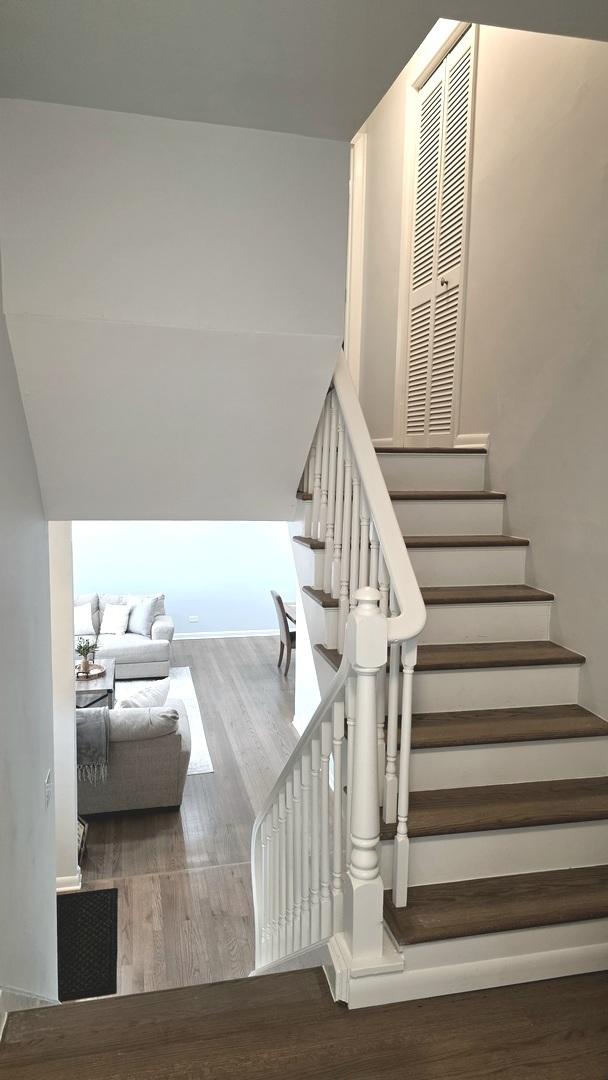 517 Appletree Ln, Deerfield, IL 60015 - stairs featuring wood finished floors