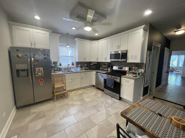 8233 S Manistee Ave, Chicago, IL 60617 - kitchen featuring stainless steel appliances, tasteful backsplash, white cabinets, ceiling fan, and recessed lighting