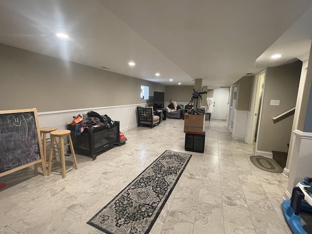 8233 S Manistee Ave, Chicago, IL 60617 - finished below grade area featuring recessed lighting and a wainscoted wall