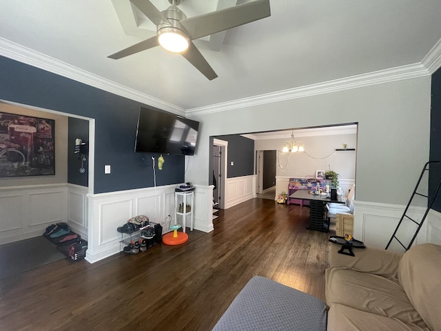 8233 S Manistee Ave, Chicago, IL 60617 - living area featuring a chandelier, ornamental molding, wainscoting, ceiling fan, and wood finished floors