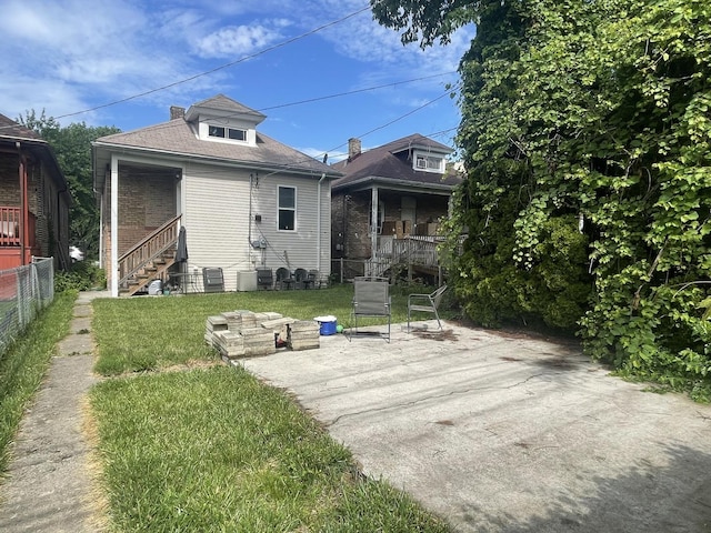 8233 S Manistee Ave, Chicago, IL 60617 - back of property with stairs and a patio