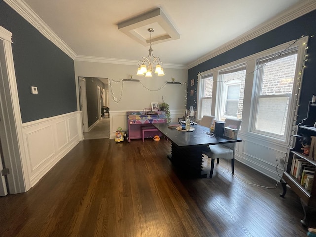 8233 S Manistee Ave, Chicago, IL 60617 - dining area featuring wood finished floors, crown molding, wainscoting, a chandelier, and a decorative wall