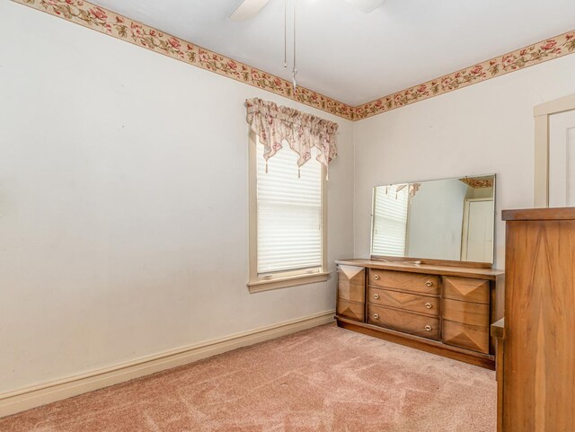 4923 W School St, Chicago, IL 60641 - unfurnished bedroom with carpet flooring and ceiling fan