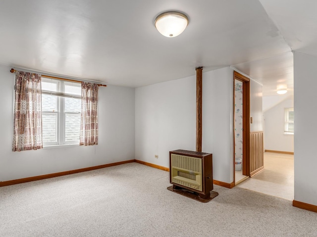 4923 W School St, Chicago, IL 60641 - carpeted empty room featuring heating unit and baseboards