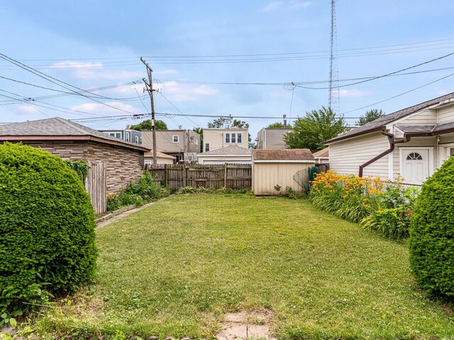 4923 W School St, Chicago, IL 60641 - view of yard featuring a shed