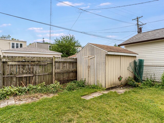 4923 W School St, Chicago, IL 60641 - view of yard with a storage unit
