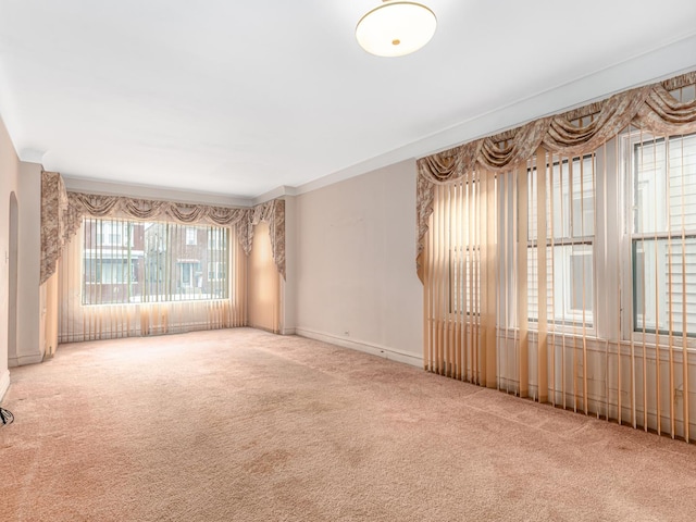 4923 W School St, Chicago, IL 60641 - carpeted spare room featuring baseboards