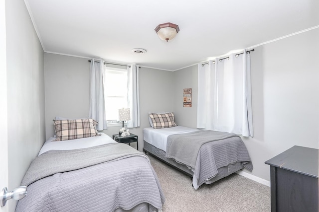 514 E Beaudoin St, Bourbonnais, IL 60914 - carpeted bedroom with baseboards and crown molding