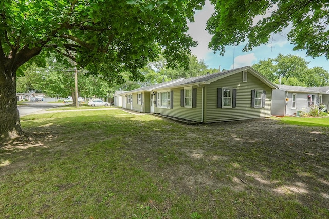 514 E Beaudoin St, Bourbonnais, IL 60914 - view of side of home featuring a lawn