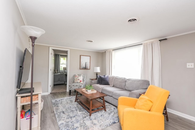 514 E Beaudoin St, Bourbonnais, IL 60914 - living room featuring crown molding and wood finished floors