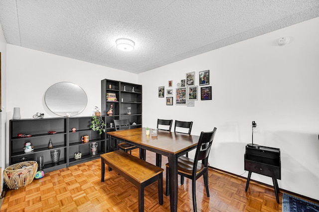 475 Plum Creek Dr Unit 212, Wheeling, IL 60090 - dining space featuring a textured ceiling
