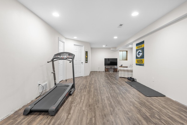 12050 Baneberry Dr Unit 9, Roscoe, IL 61073 - workout area with wood finished floors and recessed lighting