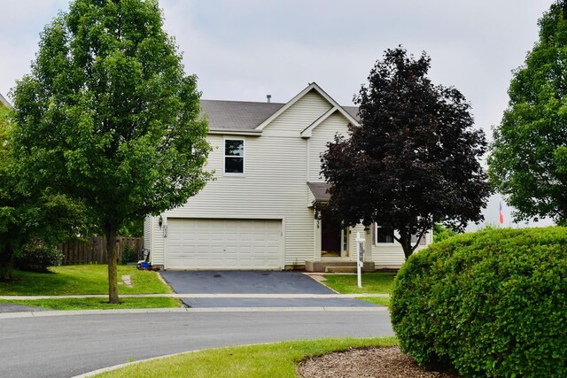 838 Valley Stream Dr, Pingree Grove, IL 60140 - view of front of house with asphalt driveway, an attached garage, and a shingled roof