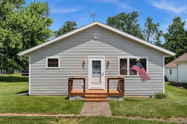 101 W Olive St, Colfax, IL 61728 - bungalow-style home featuring a front yard and a deck