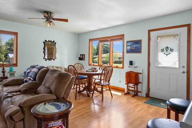 101 W Olive St, Colfax, IL 61728 - living room featuring plenty of natural light, light wood finished floors, and a ceiling fan