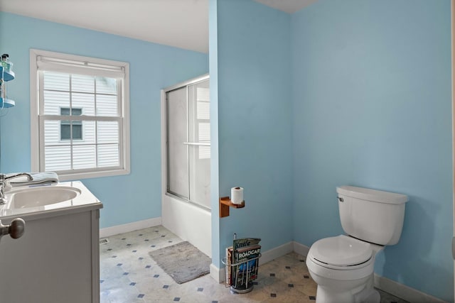 101 W Olive St, Colfax, IL 61728 - bathroom featuring vanity, enclosed tub / shower combo, and tile patterned floors