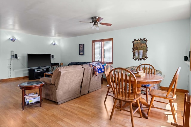101 W Olive St, Colfax, IL 61728 - dining area with a ceiling fan and light wood-style flooring